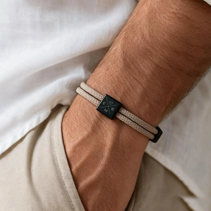NORTH bracelet in taupe, close-up of the engraved clasp