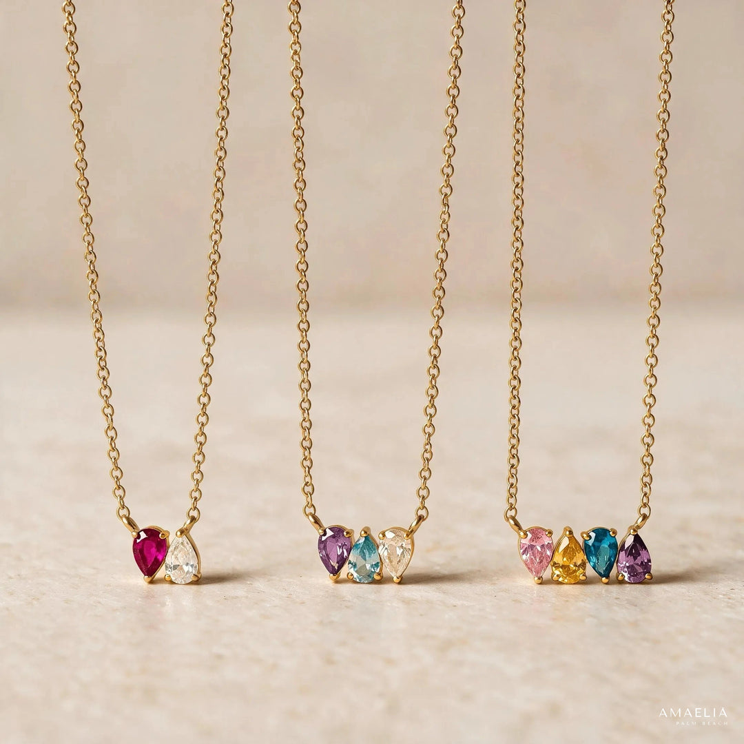 Three ROSALIE necklaces in gold, with one, three and four birthstones